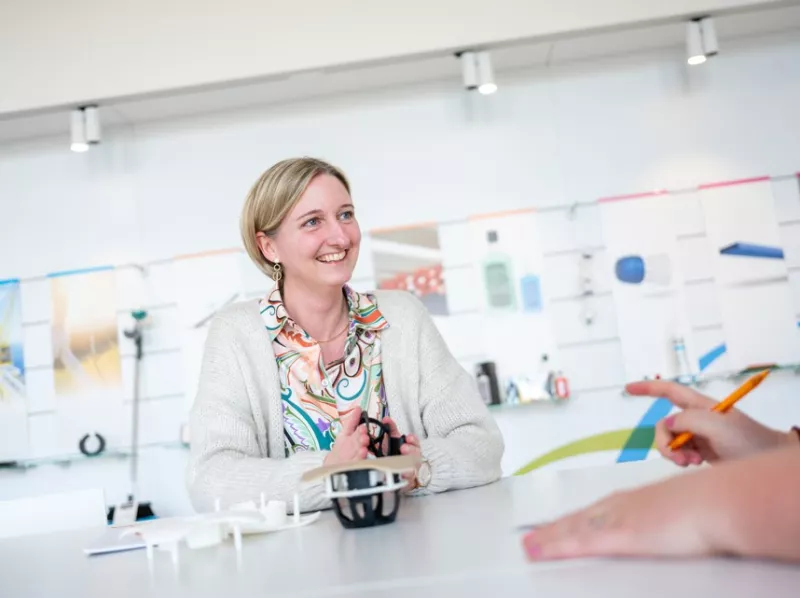 Colleague Vanessa Verbeken talking to a client